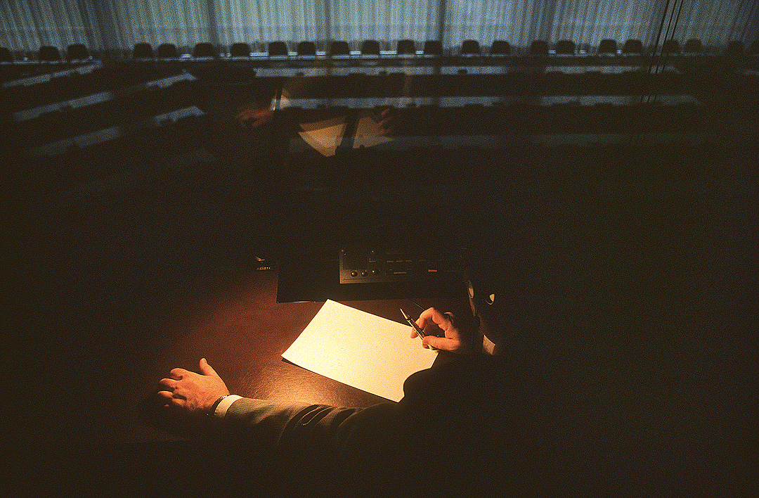 AI.1.00087.0002 / Conference interpreter Konstantin IVANOV in the booth of ILO headquarters conference room